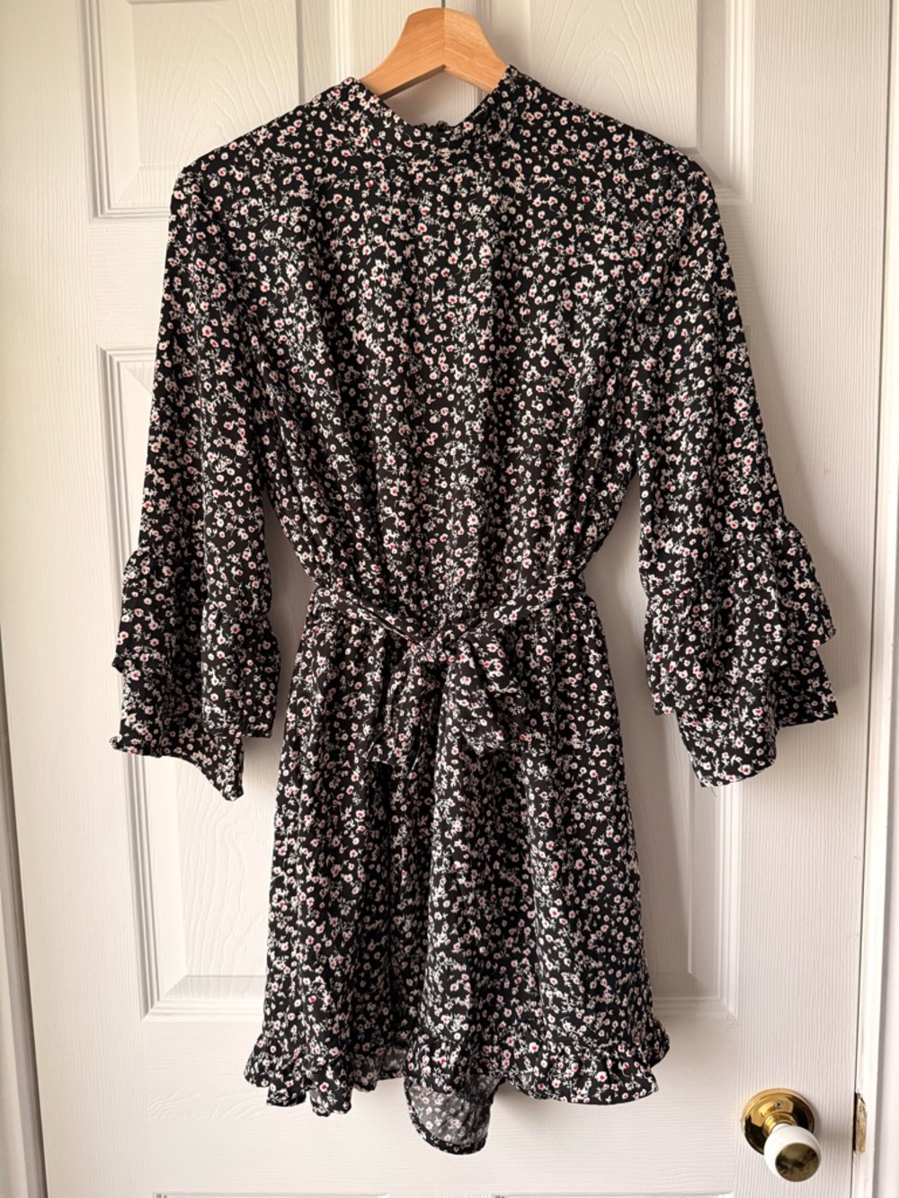 Dynamite Black Floral Ruffle-Sleeve Romper with Red & White floral accents